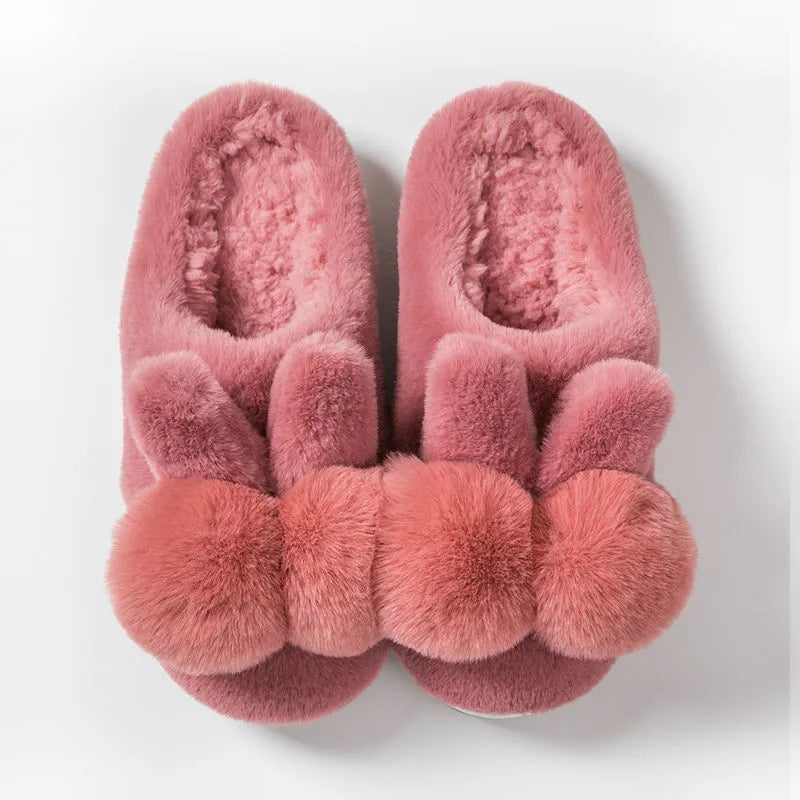 Women's rabbit fur winter slippers with high upper, floral pattern, and bunny-inspired fluffy design