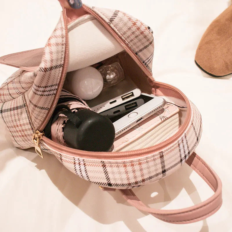 A one shoulder diagonal crossbody phone bag made from PU leather in one of five colour options.