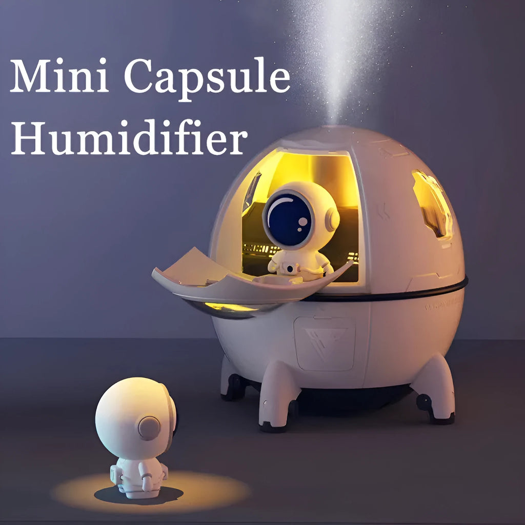 Purple astronaut shaped desktop humidifier with 220ml tank and USB cable