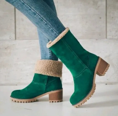 Women's thick suede mid-calf snow boots with a round toe, flat low heel, and waterproof platform sole.