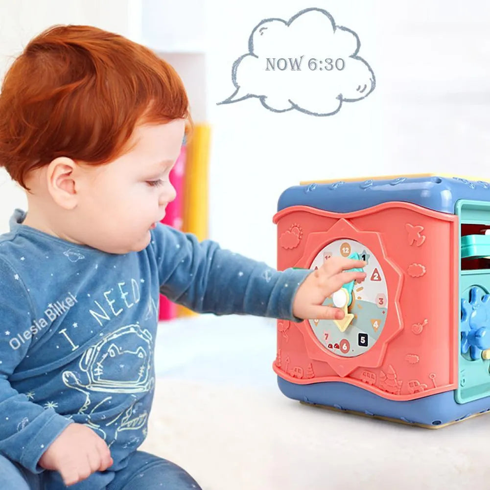 Colourful baby educational toy cube with six different activity sides including bead maze and gears.