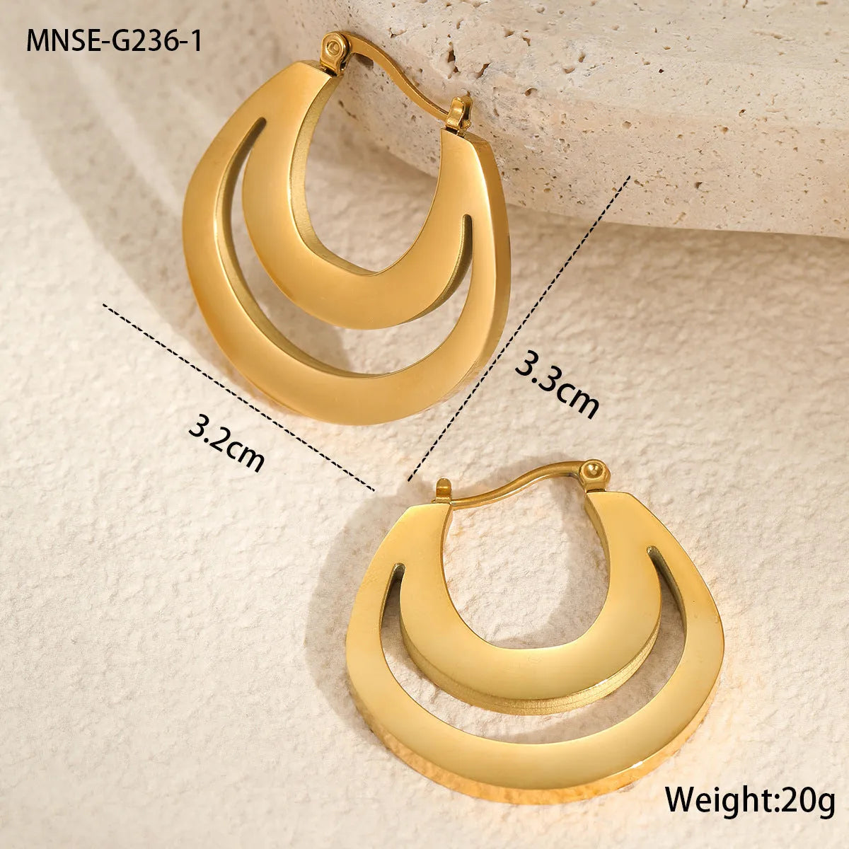 A pair of women's geometric French earrings with a round ring design, available in gold or steel colour.