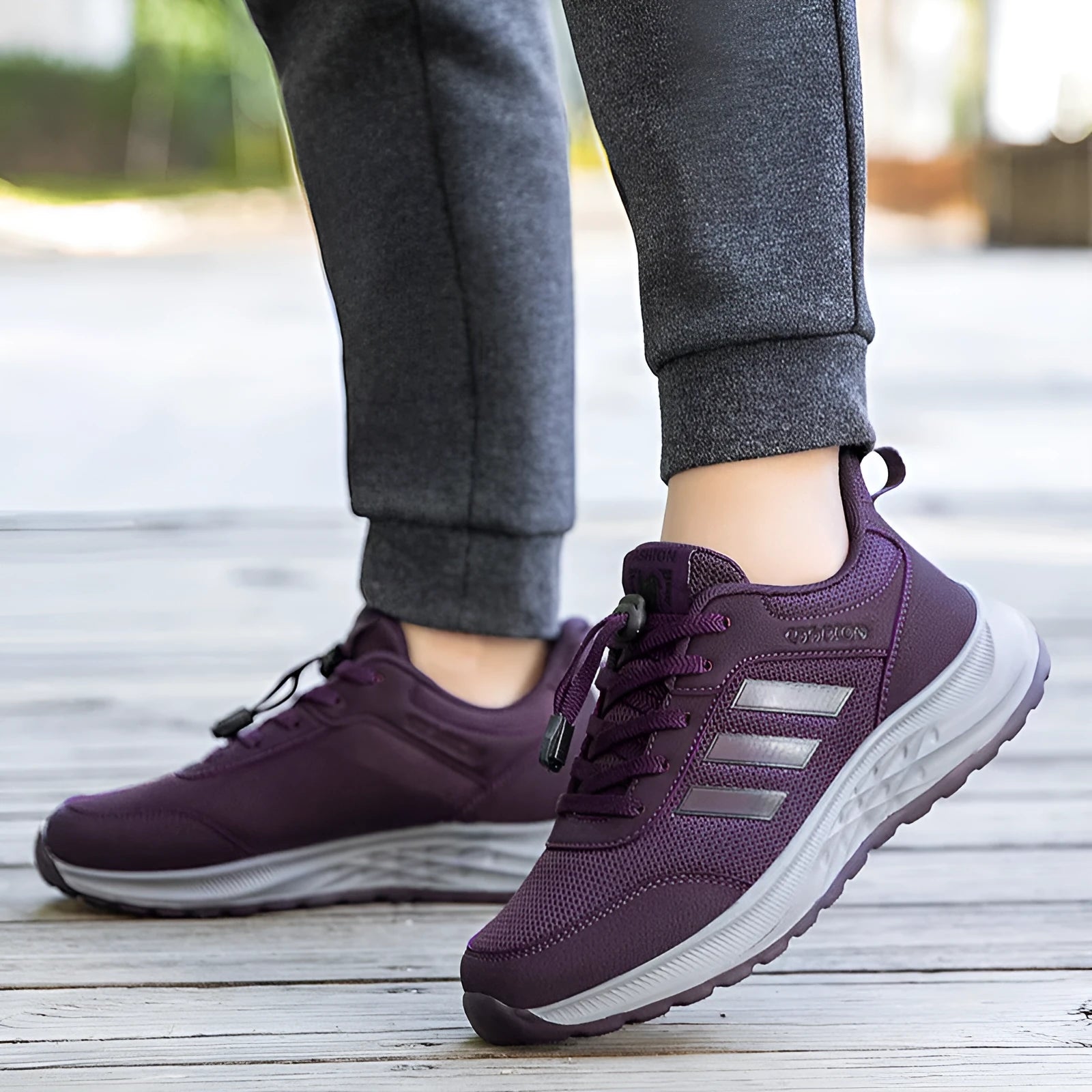 Breathable non-slip casual shoes with mesh upper and elastic band closure in black, dark grey, purple, and purplish red.