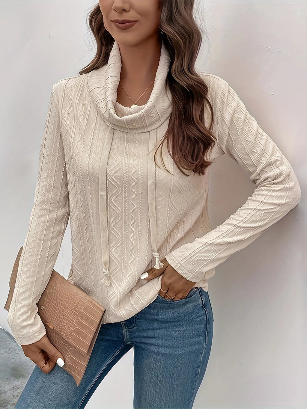 Apricot coloured hooded pullover sweater with long sleeves and drawstring