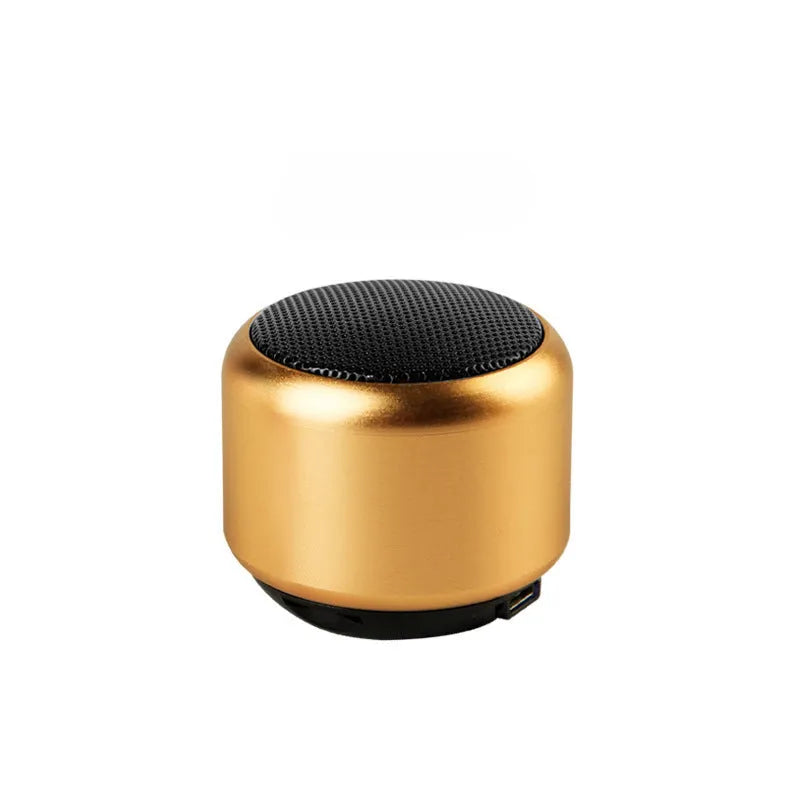 Small portable outdoor mini speaker in black, blue, gold or pink with Bluetooth wireless capability
