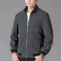 Men's grey fleece zip-up jacket with side pockets on a hanger