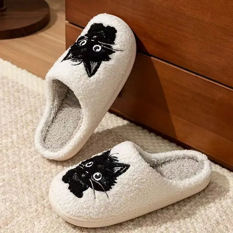 White plush slippers with Black Beard cat cartoon design for couples, showing non-slip sole.