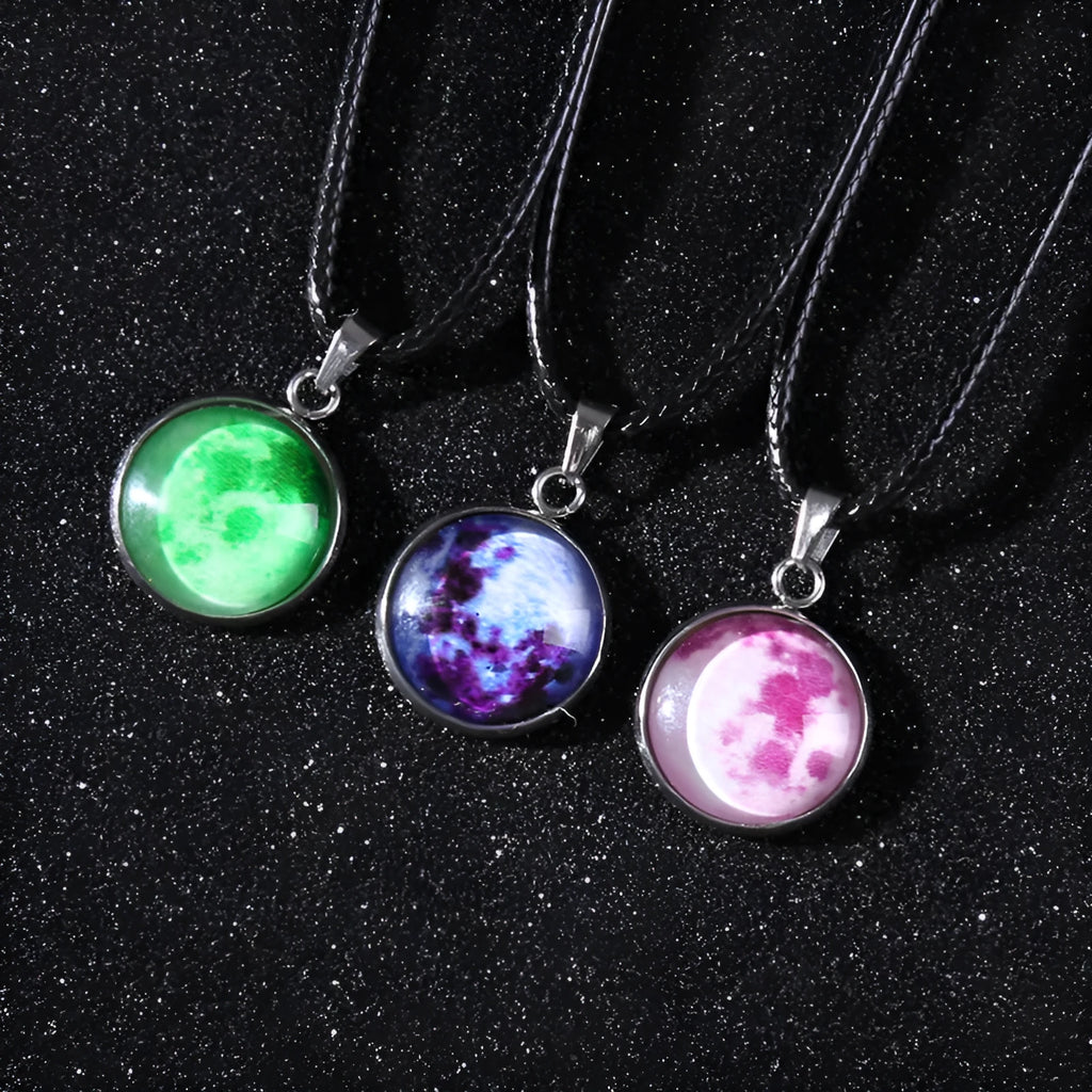 Alloy necklace with luminous glass pendant showing Christmas moon night sky and constellation design.