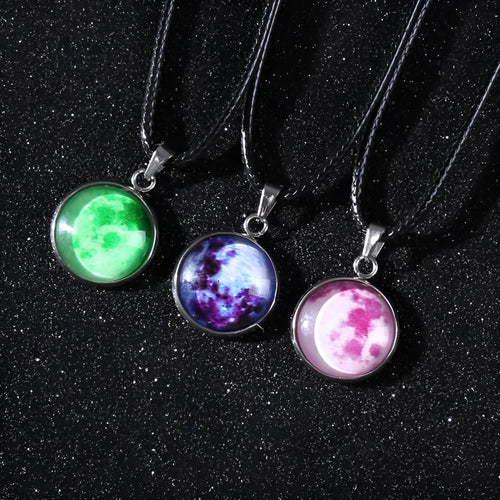 Alloy necklace with luminous glass pendant showing Christmas moon night sky and constellation design.