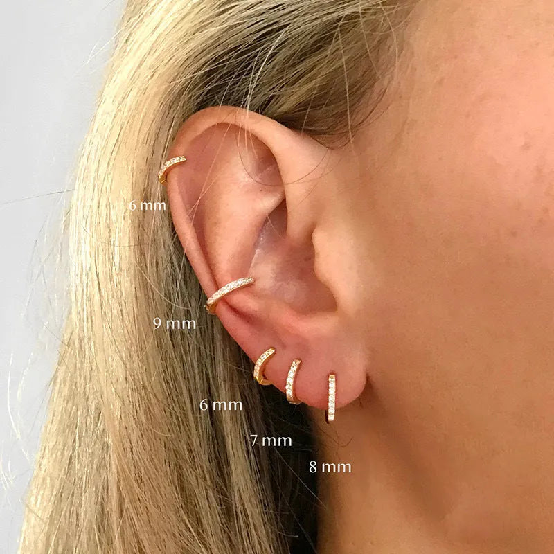 Geometric circle stud earrings with perforated pattern in gold, rose gold, or silver colour