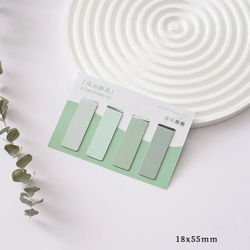 Set of four Morandi colour magnetic bookmarks showing miniature size and magnetic closure design