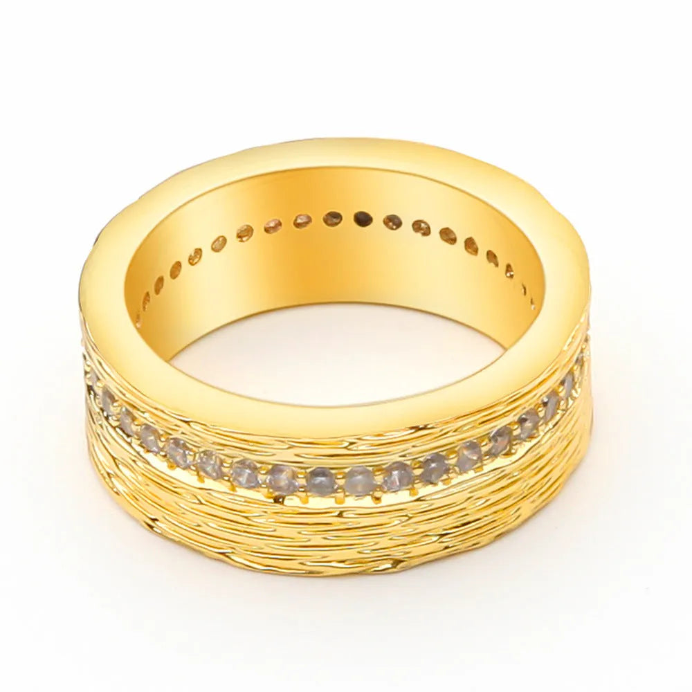 Geometric gold-coloured zircon ring for women, shown in size 7.