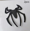 3D metallic spider bumper sticker in gold, silver, black, and red colour options.