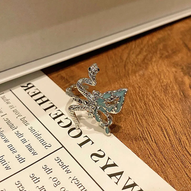Creative Chinese butterfly women's copper ring with dripping oil treatment process in simple style.