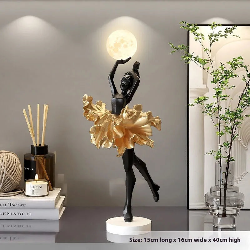 Art Girl Atmosphere small resin night light in Black Gold colour with USB charging cable.