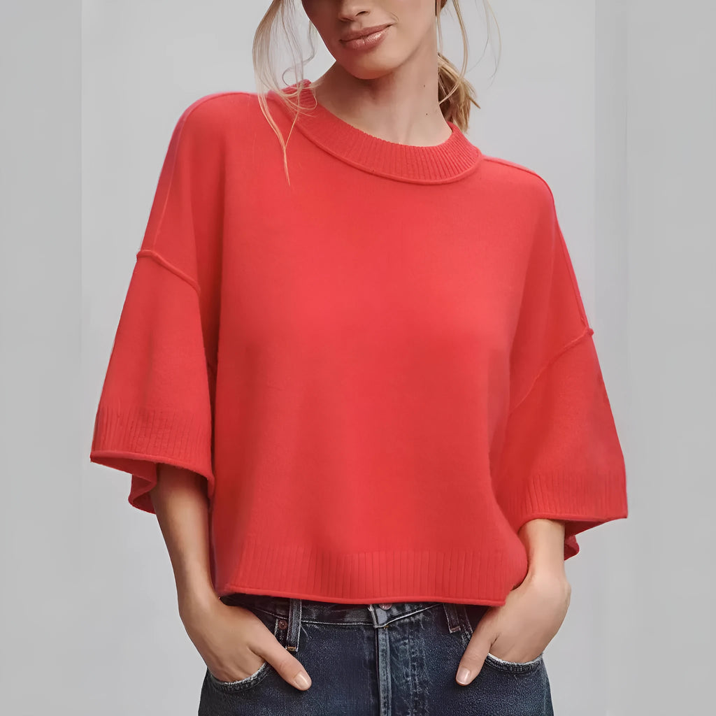 Red or white short viscose fibre T-shirt with an exposed navel cut, shown on a model.