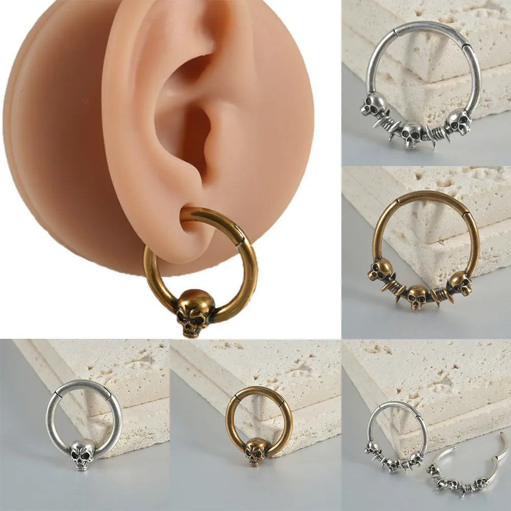 Punk copper earrings with vintage ghost head design in antique gold finish