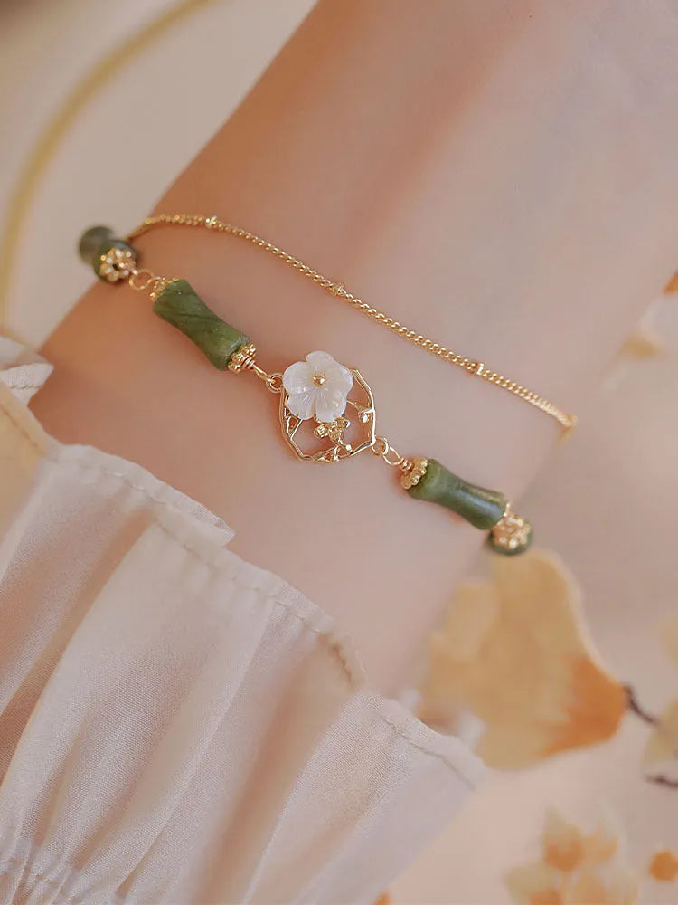 Natural olivine double layer bracelet with Bells of Ireland charms and olive branch detailing