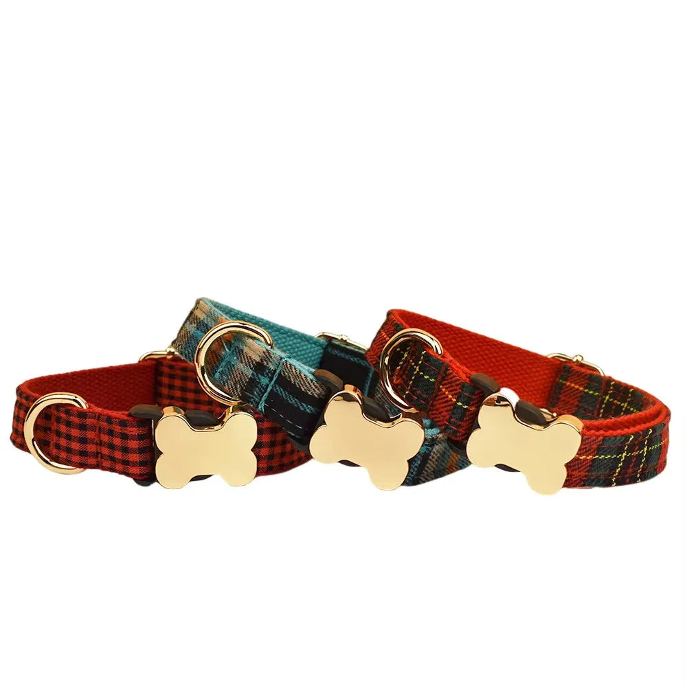 Nylon dog collar with printed grid pattern and a bone-shaped metal buckle in a selected colour.