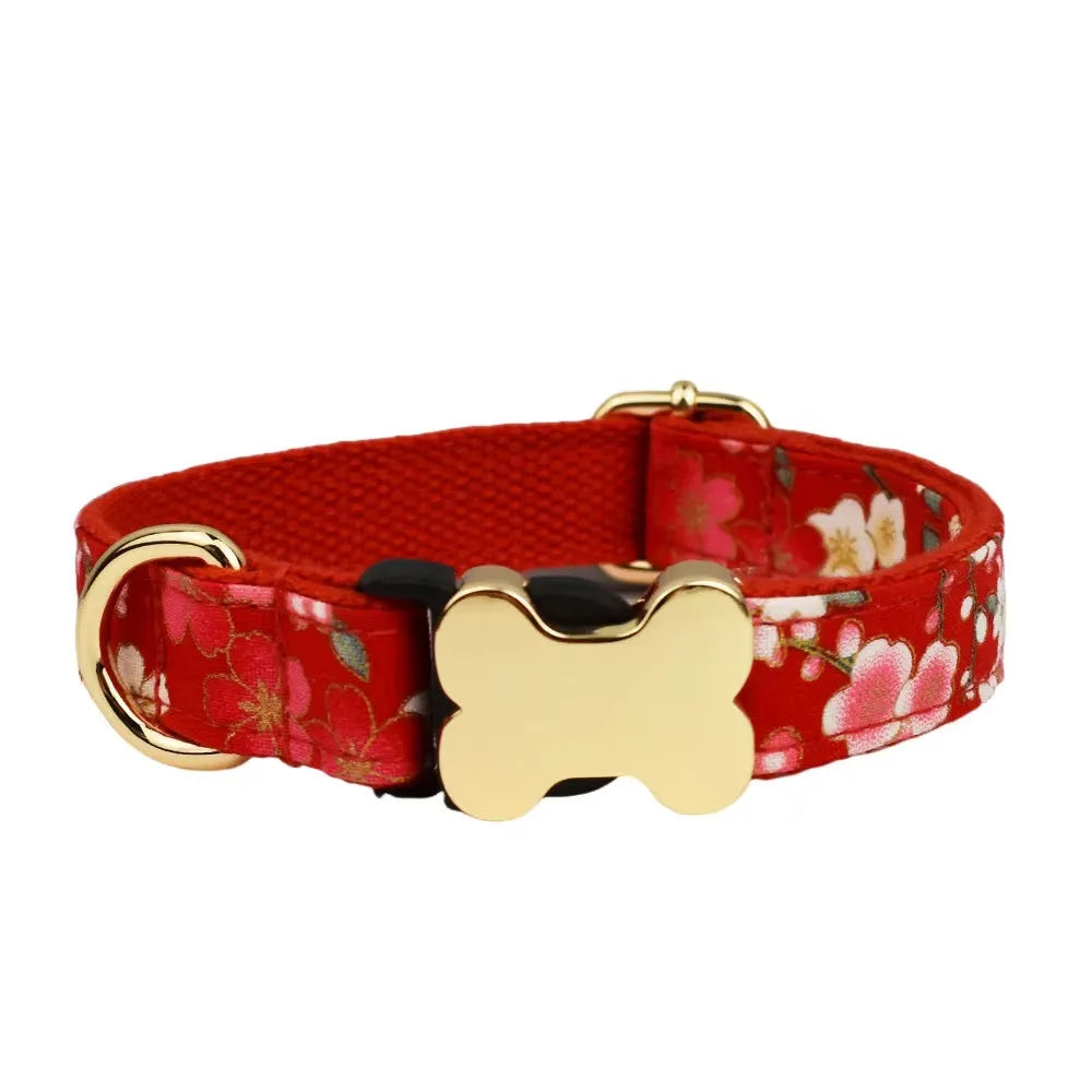 Nylon dog collar with printed grid pattern and a bone-shaped metal buckle in a selected colour.