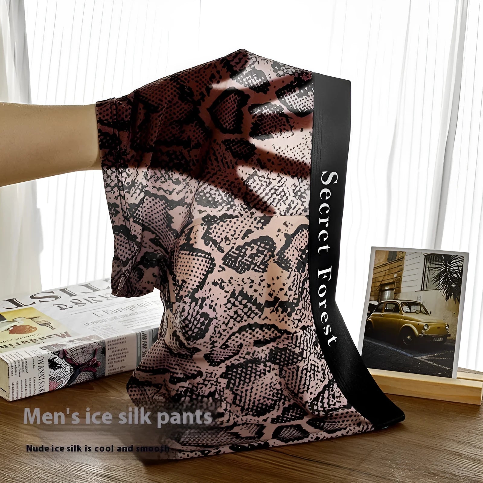 Men's thin polyester boxer shorts in black, grey, and brown with loose fit and mid-rise waist