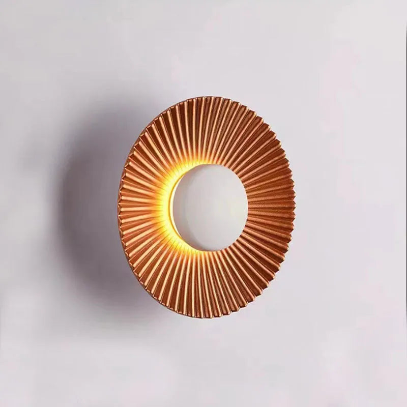 Round aluminium wall lamp with LED light source in multiple colour combinations for bedroom or living room