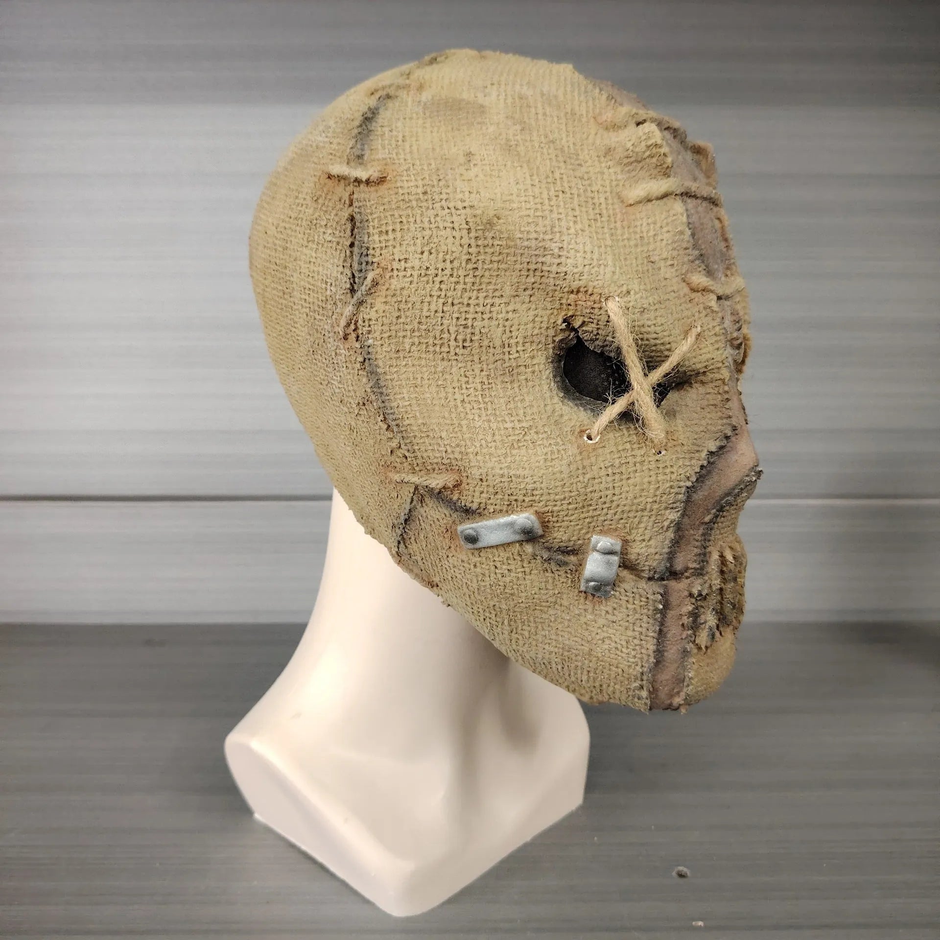 Latex Halloween mask with scar skull horror design showing full head coverage