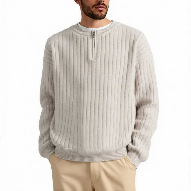 Men's grey loose fit half zip pullover sweater with textured knit and long sleeves