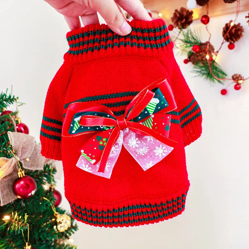 Red and green Merry Christmas dog jumpers for small to large pets on a festive background