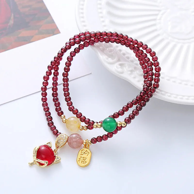 Purplish red garnet fox bracelet with adjustable cord for women