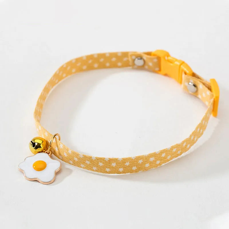 Adjustable cat collar with bell pendant and bow tie accessory for small pets