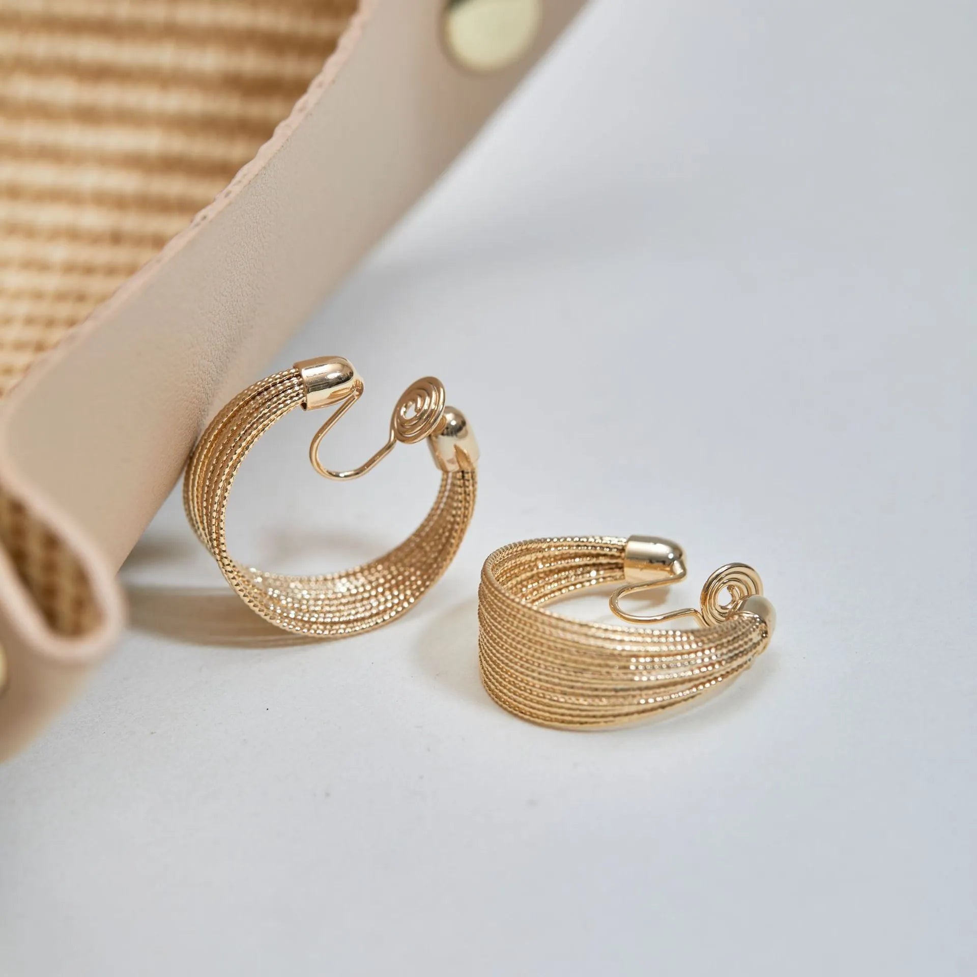 Geometric copper earrings with multi-layer bracelet design in gold and silver electroplated finishes