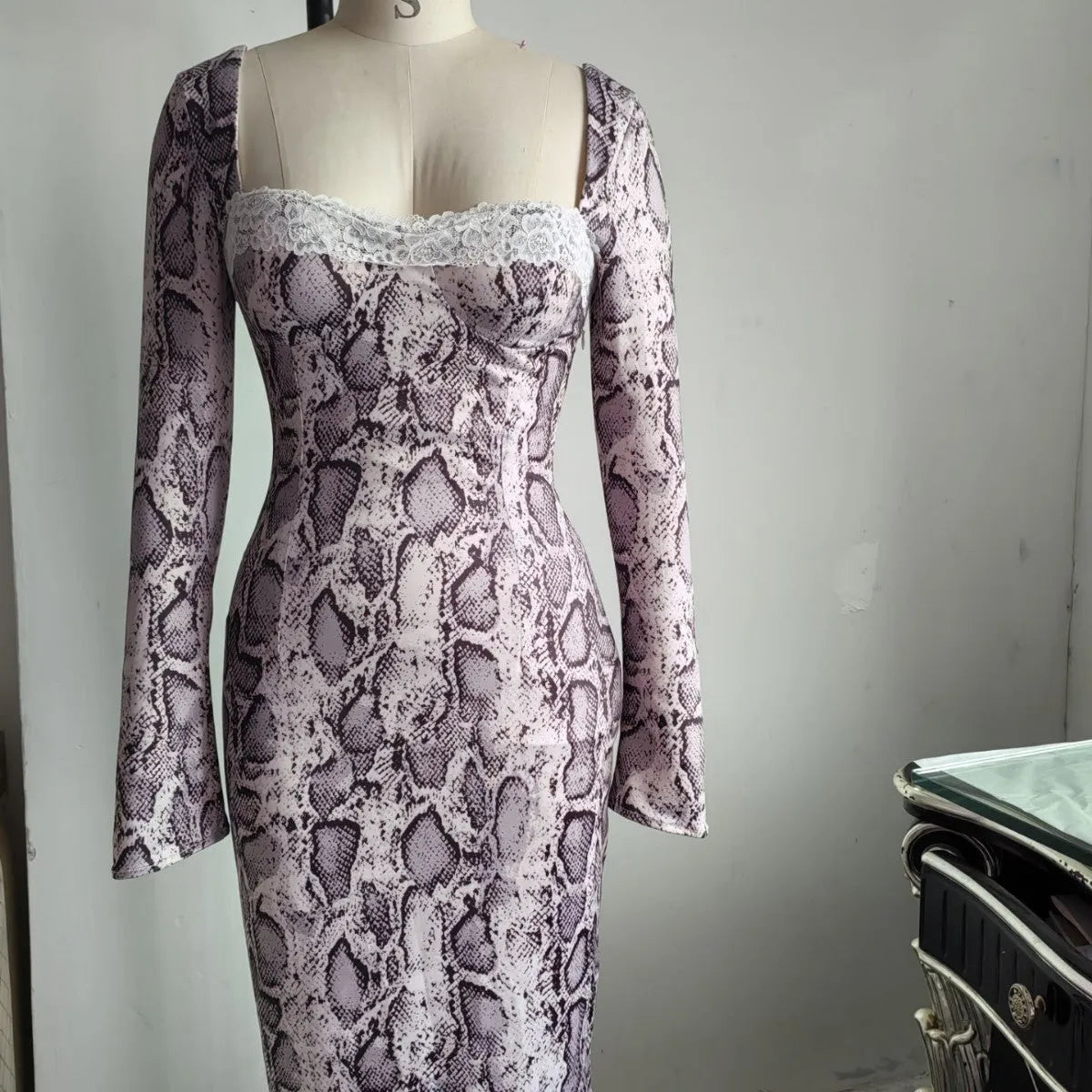 Grey women's slim fit lace dress with 3D digital print pattern and long sleeves.