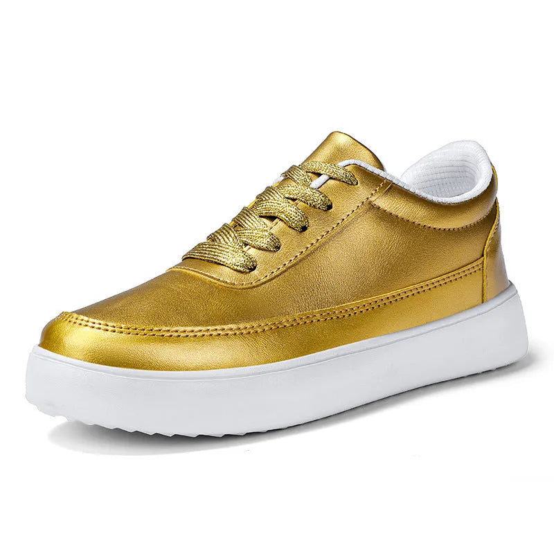 Women's white leather flat casual lace-up shoes on a neutral background.