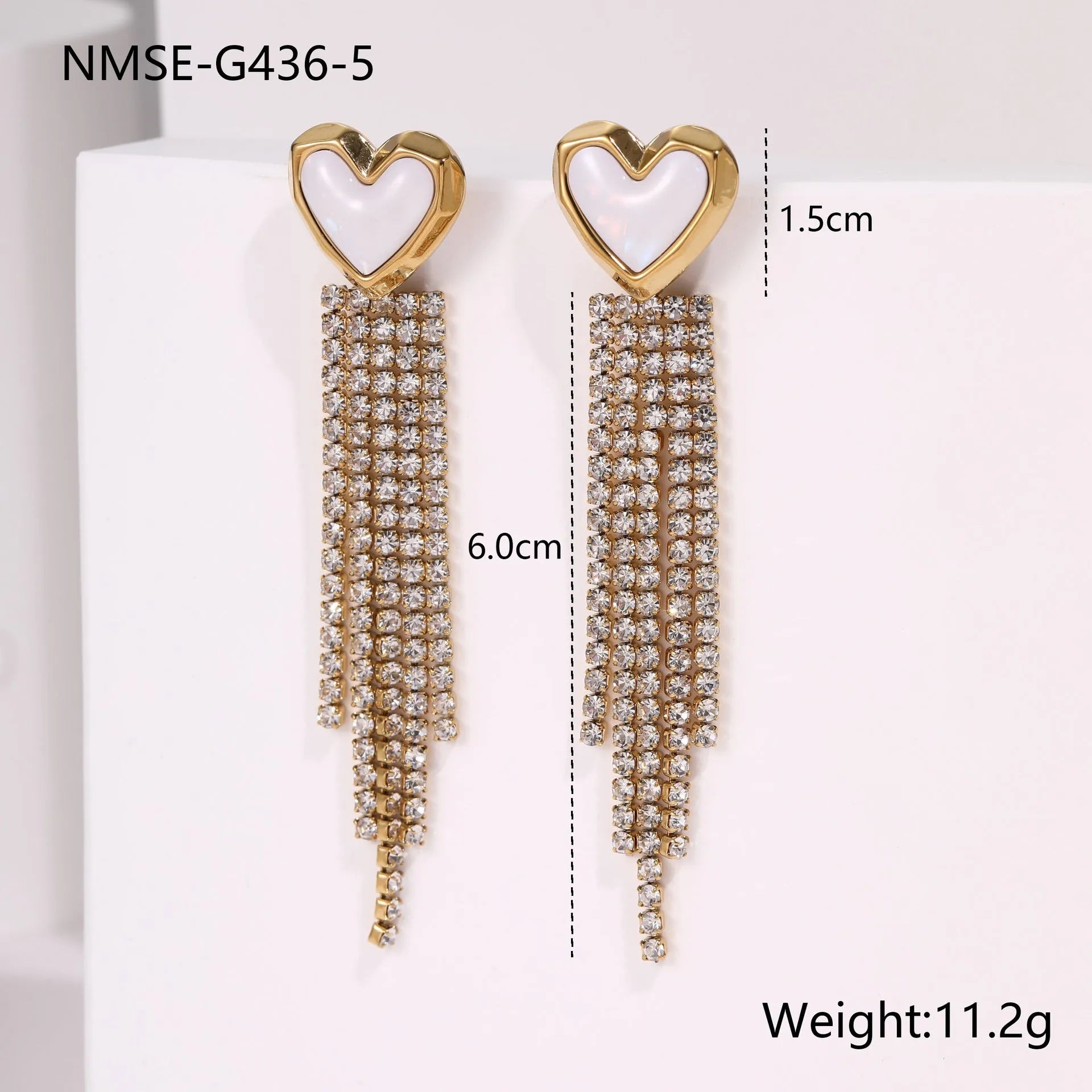 Gold plated geometric earrings for women featuring heart and star shapes with a diamond tassel.