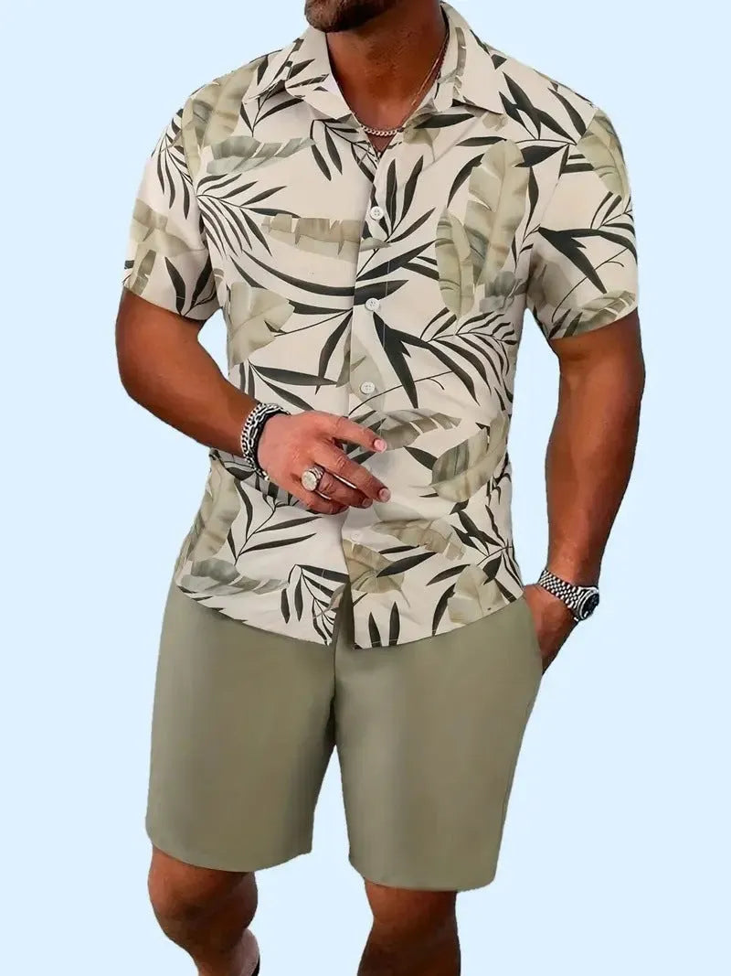 Man wearing a blue Hawaiian 3D printed short sleeve top and matching shorts leisure suit set.