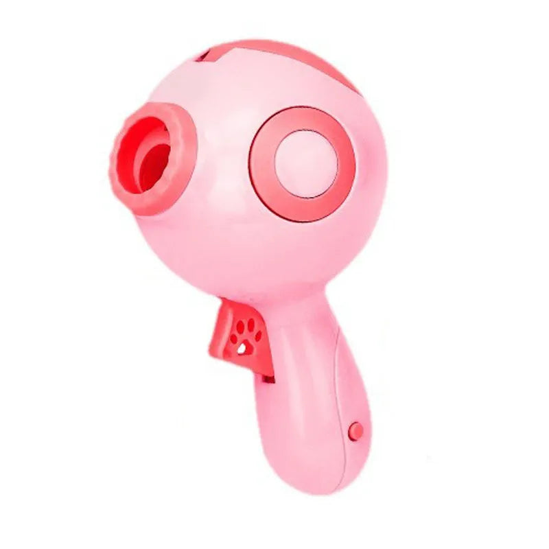 Green, orange or pink dog treat launcher toy measuring 15.5 x 9 x 8.5 cm for interactive play