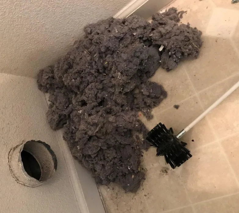 Flexible chimney and dryer vent cleaning brush with nylon bristles, shown bent.