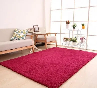 Solid colour fluffy plush rectangle carpet showing soft pile and non-slip dotted bottom.