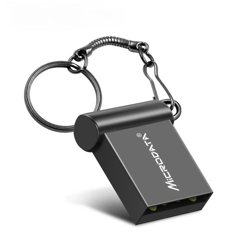 Silver metal car-shaped USB flash drive on a chain, shown alongside black and gold colour variants.