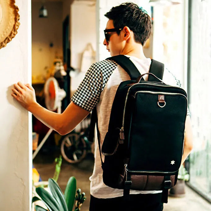 Modern Korean style men's backpack in Oxford cloth showing army green colour option.