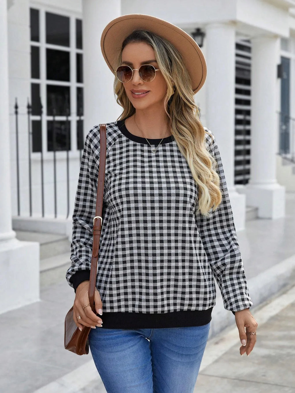 Black Japanese style plaid pullover sweater with long sleeves and printed pattern