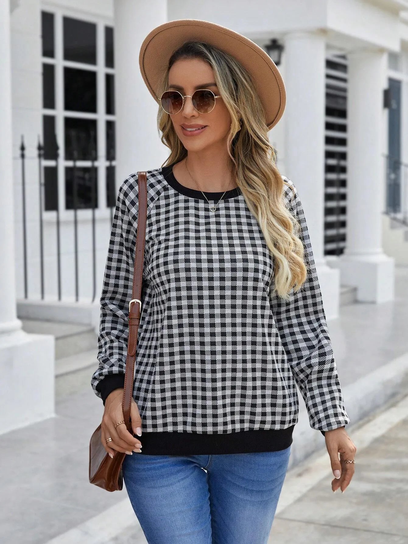 Black Japanese style plaid pullover sweater with long sleeves and printed pattern
