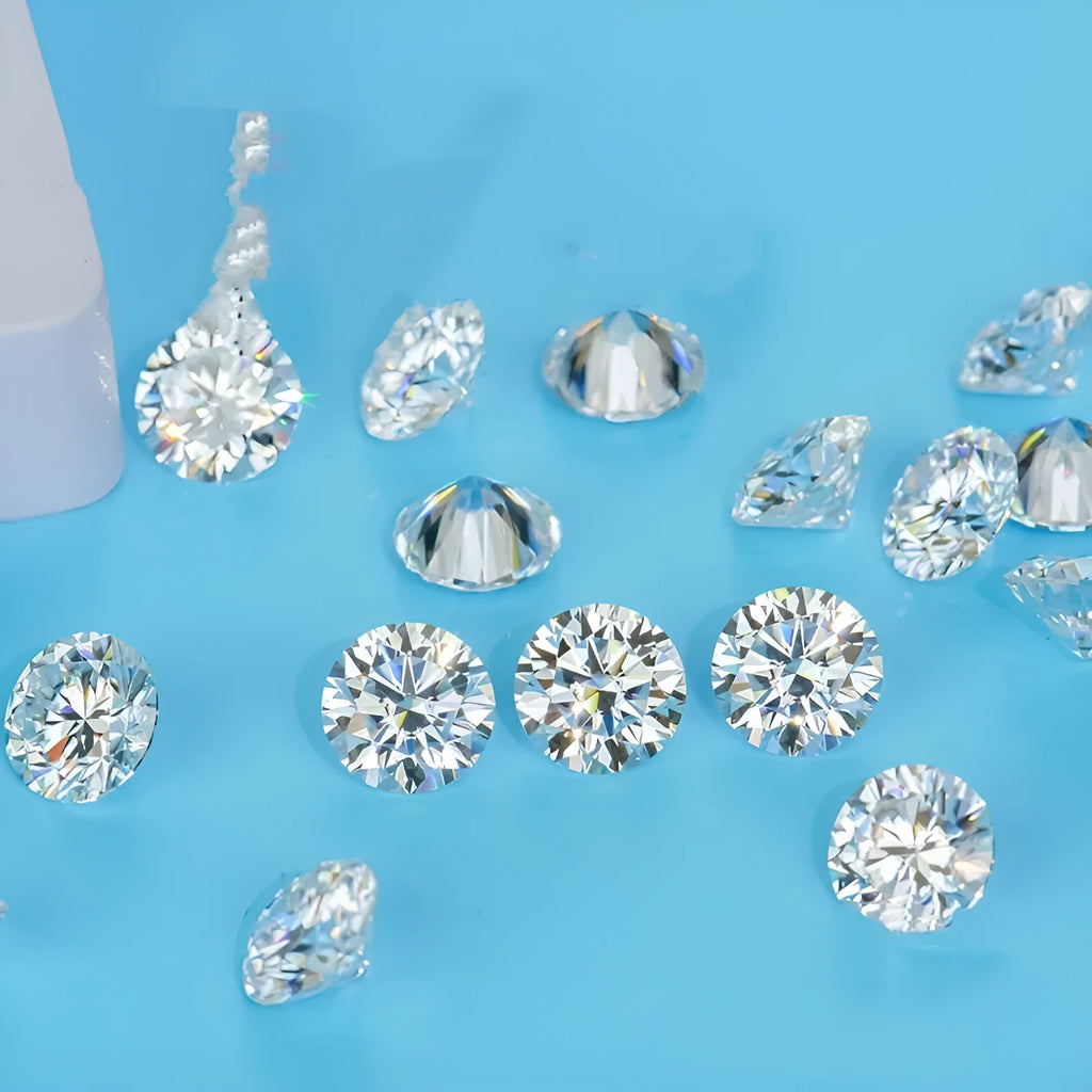 Round moissanite loose gemstone with eight hearts and eight arrows cut on a white background.