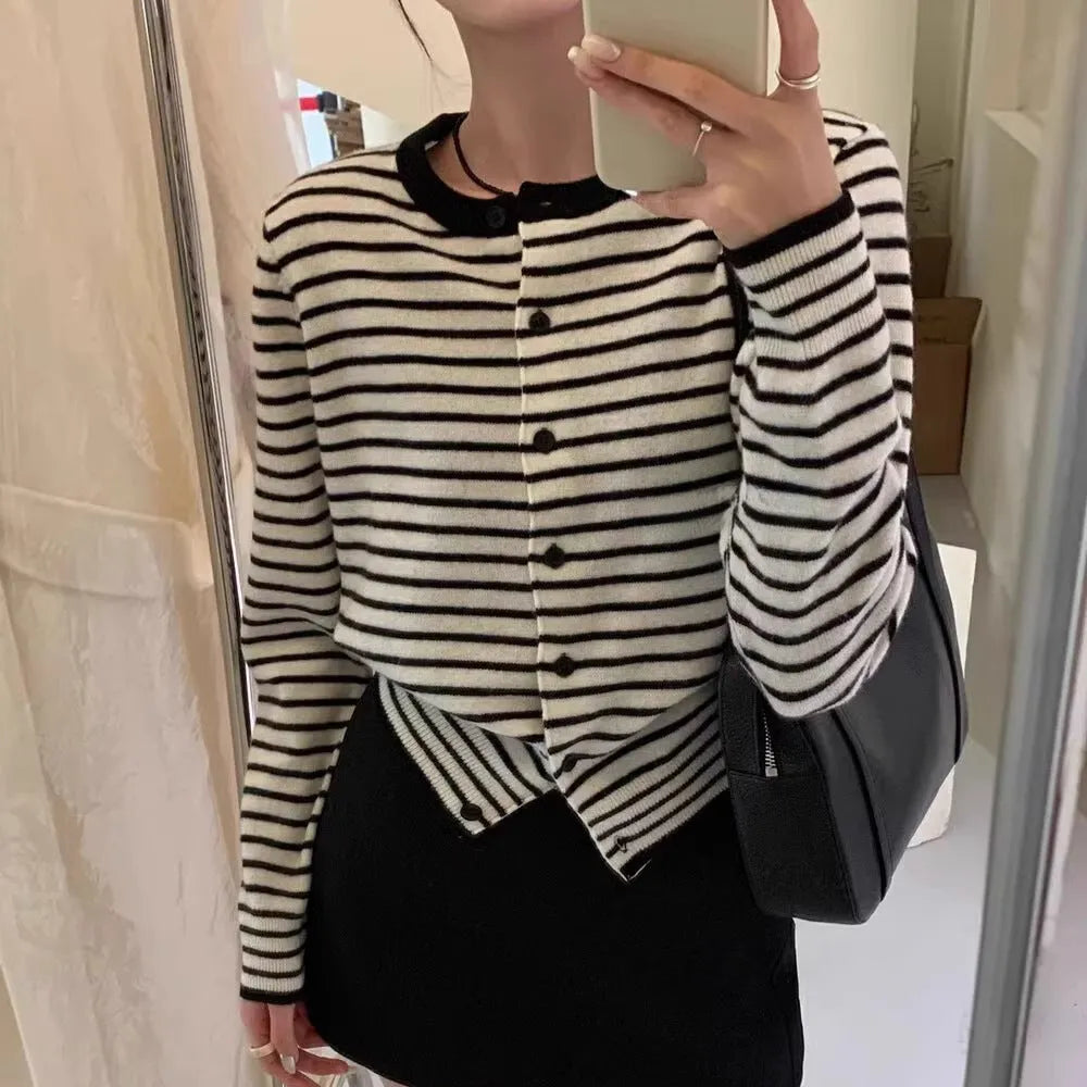 Dark grey and white striped slim fit women's cardigan with long sleeves.