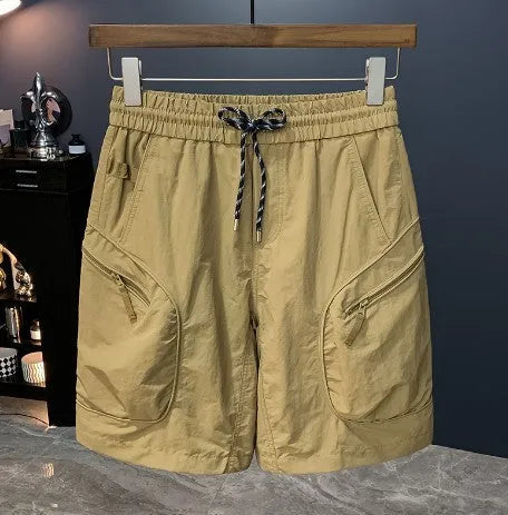 Men's camouflage cargo shorts in a loose fit with multiple pockets, shown in camouflage pattern.
