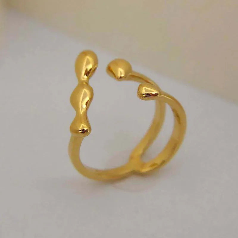Brass women's fashion ring with spherical design in gold or silver adjustable ring