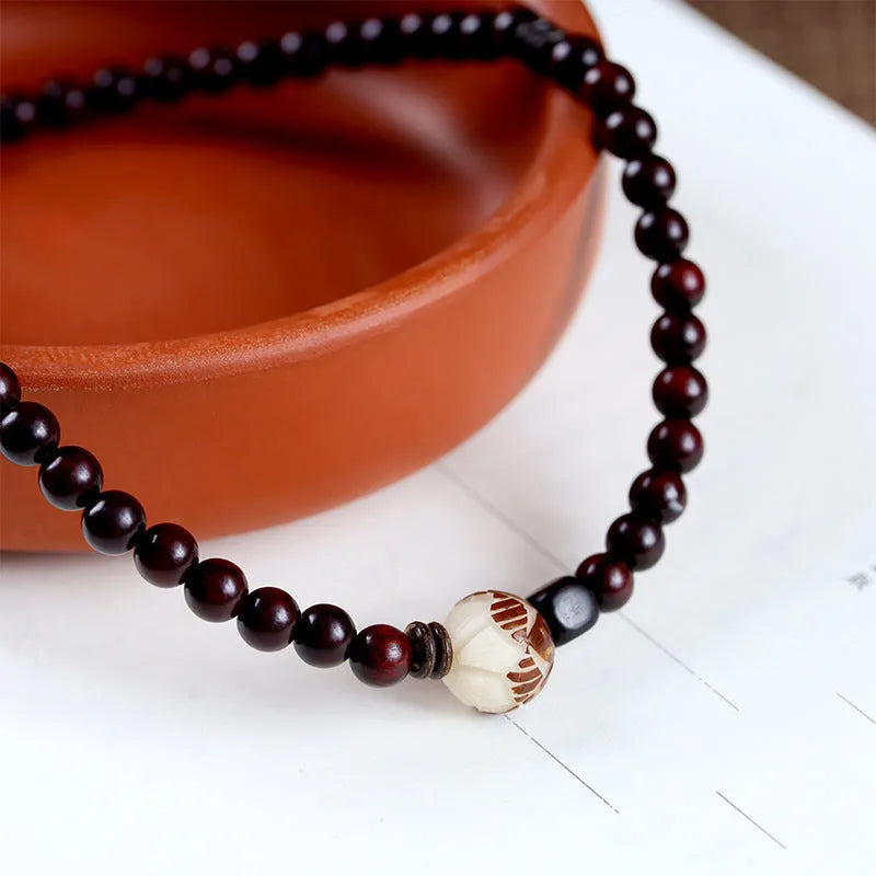 Natural rosewood double-ring bracelet with 10mm flower-shaped beads and knitted construction