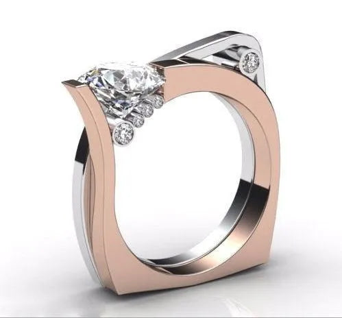 Rose gold geometric alloy couple ring with inlaid zircon stone, shown on a finger.