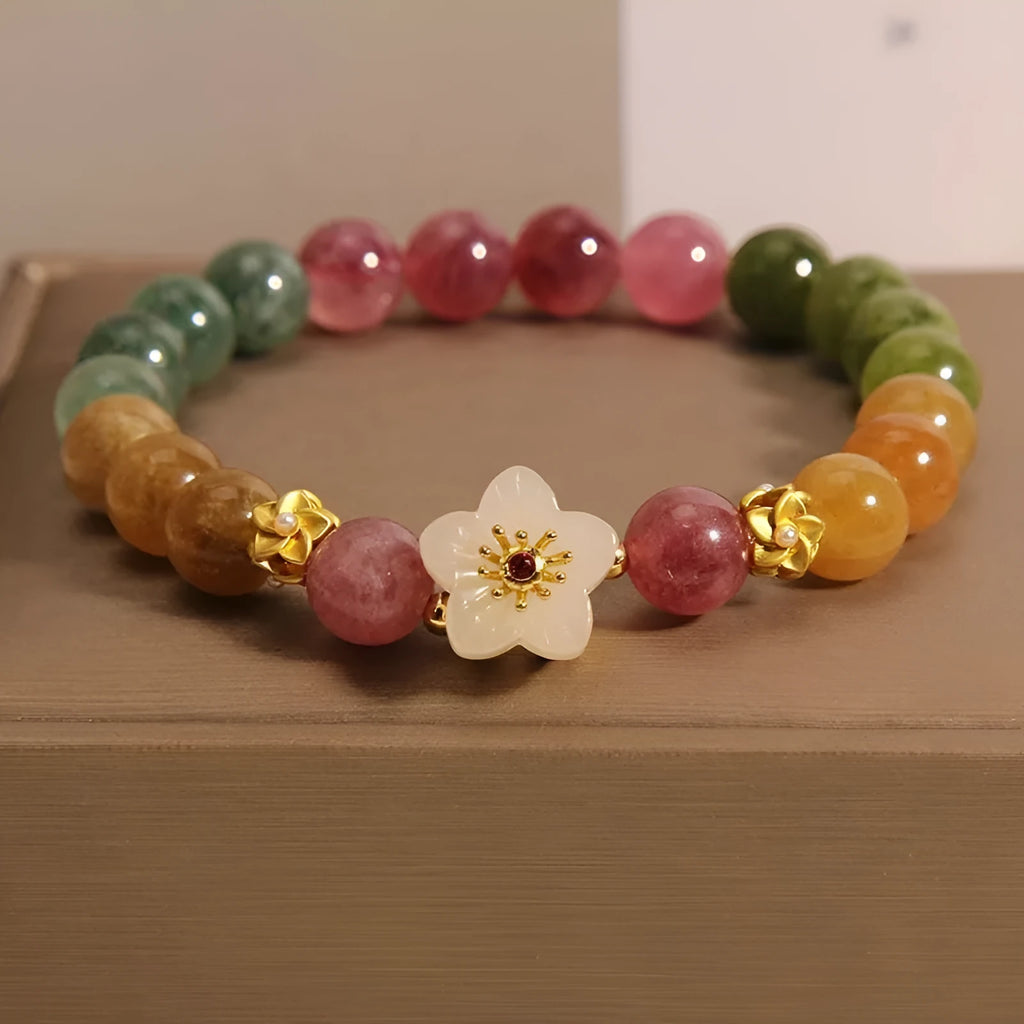 Natural colour tourmaline bracelet with electroplating in flower or fu character geometric design
